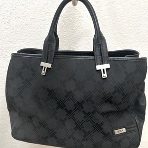 TUMI  A very comfortable bag when traveling.